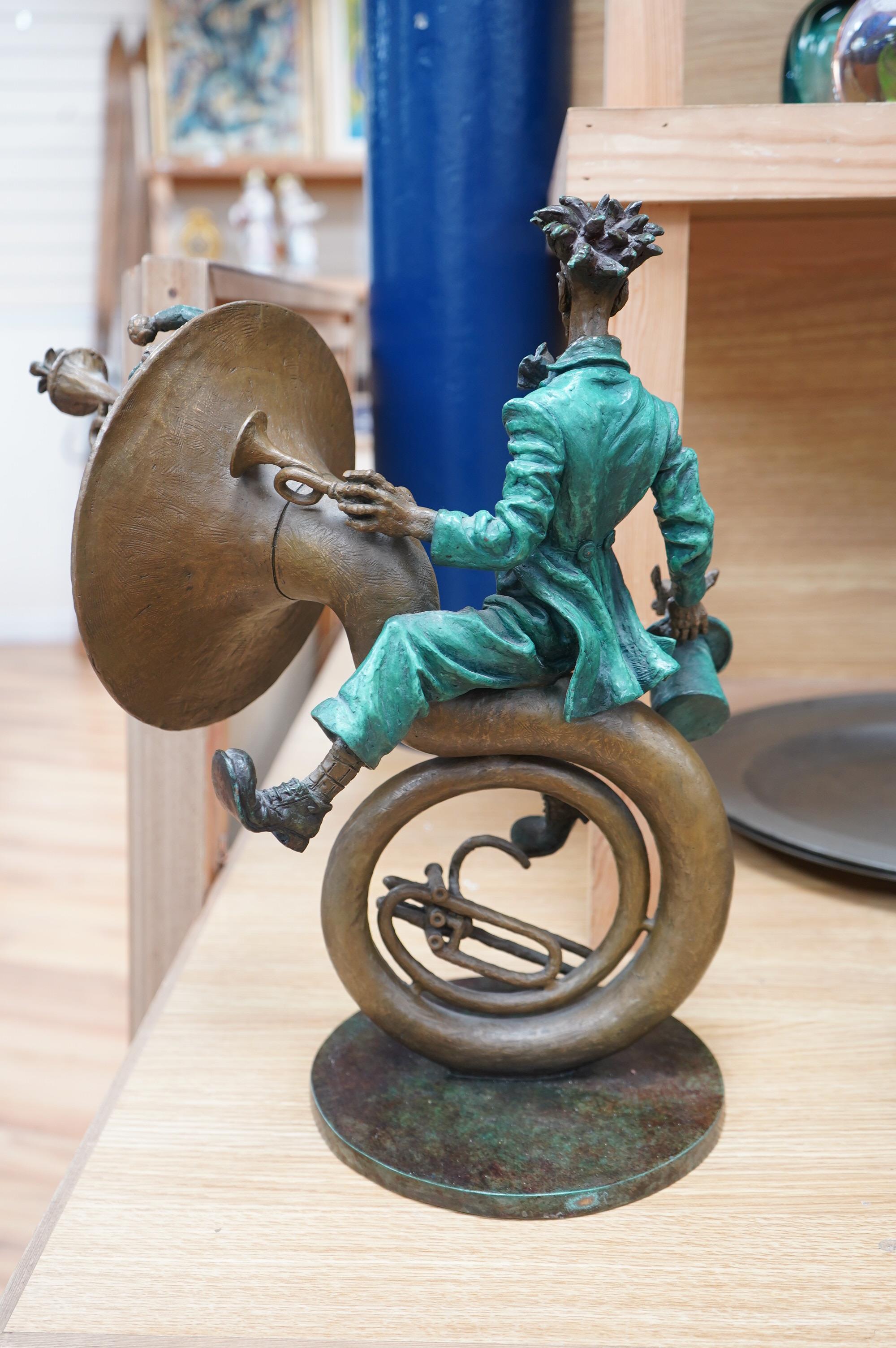 A Cirque du Soleil bronze sculpture of a clown on a sousaphone, after Sergey Bondarenko, script signature, 42cm high. Condition - good